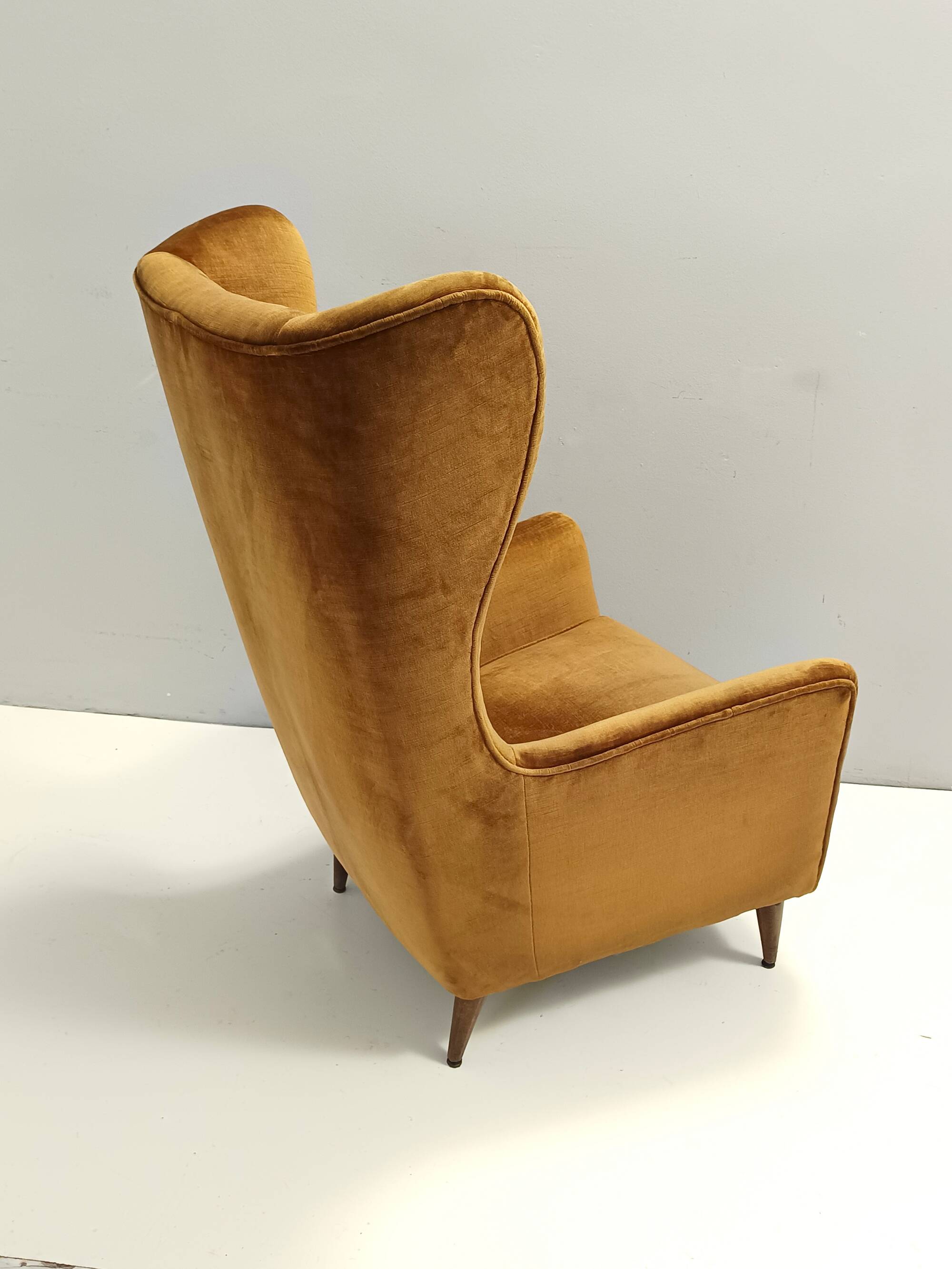 Dark Goldenrod Wingback Armchair model 437 by Gio Ponti for Cassina