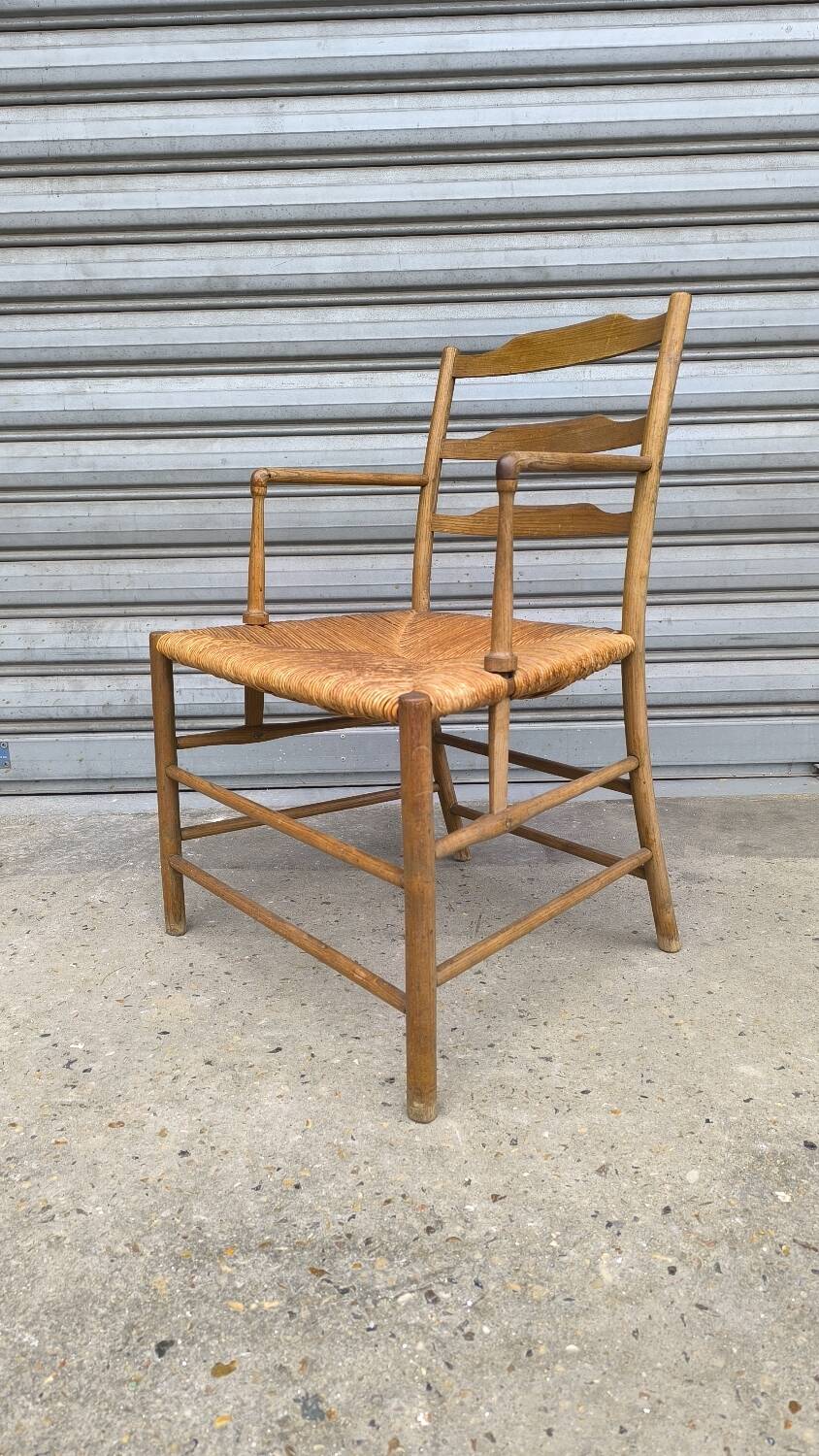 Early 19th century stepped back armchair