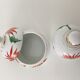Y. Ginther porcelain jar and toilet jar