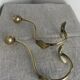 Pair of ball and hook coat hooks in brass