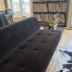 Red Edition Stanley 3-seater sofa with matching chocolate velvet storage.