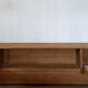 TV sideboard in raw oak and cane.