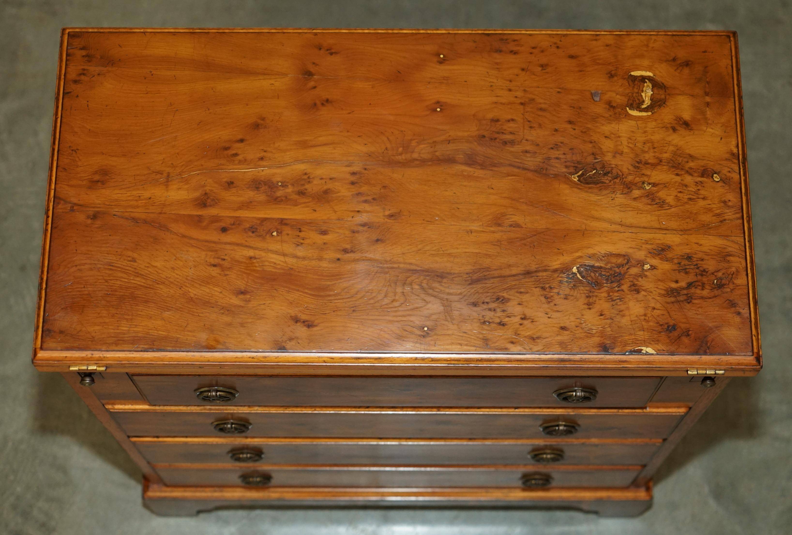 Vintage walnut commode with sliding top in Butler style.