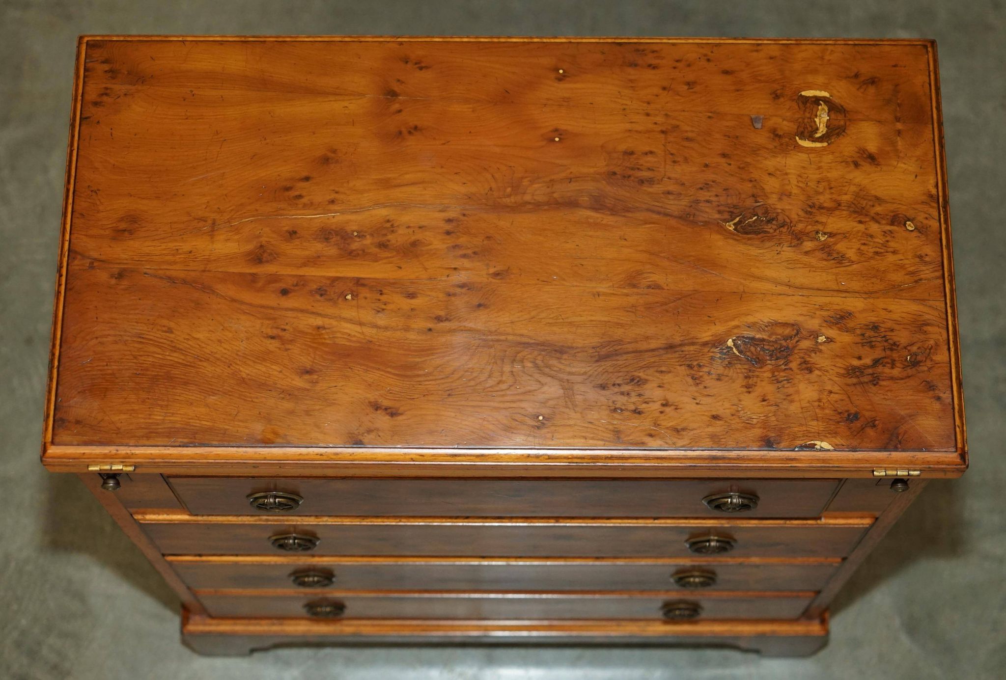 Vintage walnut commode with sliding top in Butler style.
