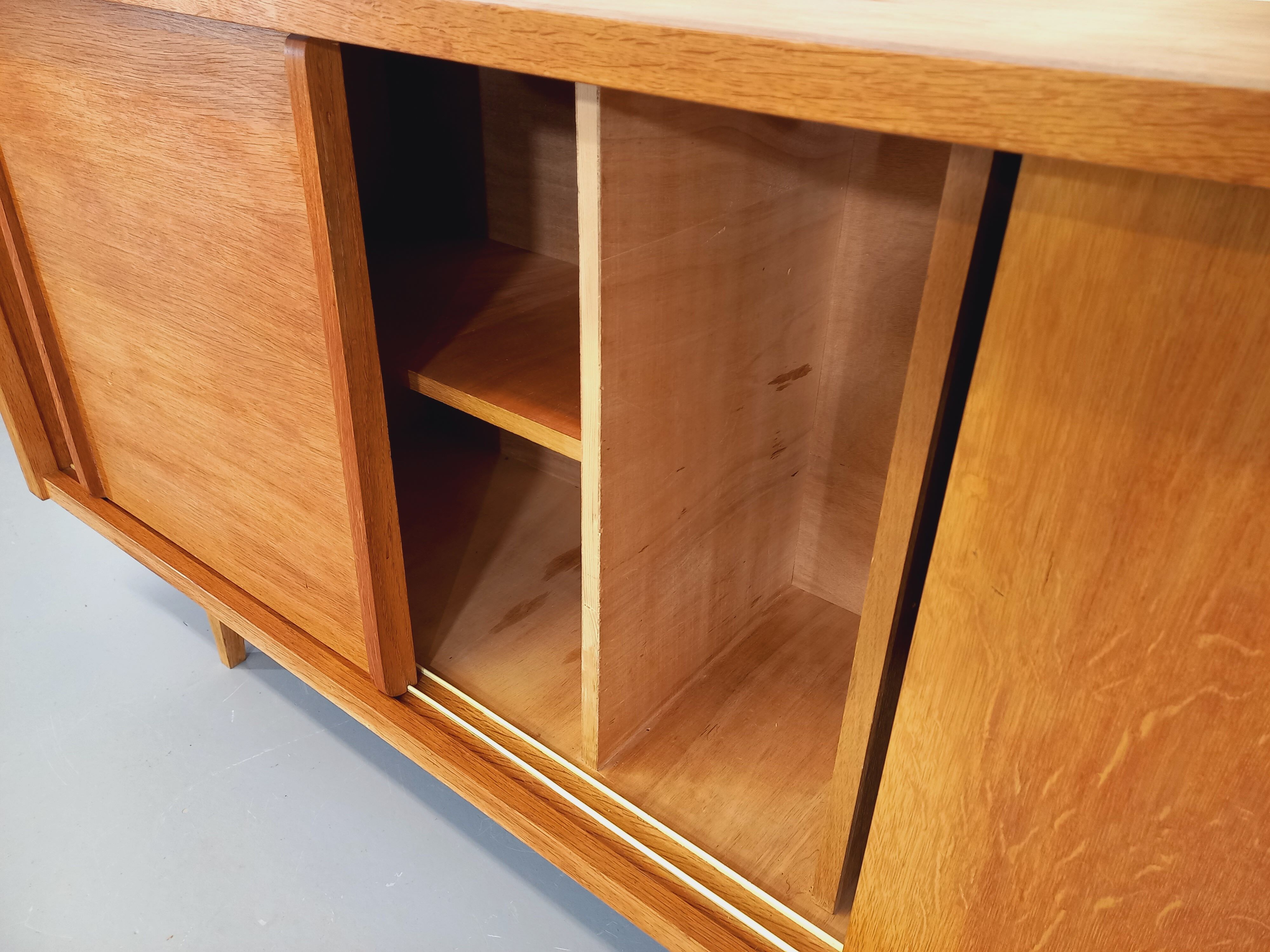 Vintage row in light oak wood from the 60s