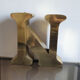 Old letter N of gilded metal sign