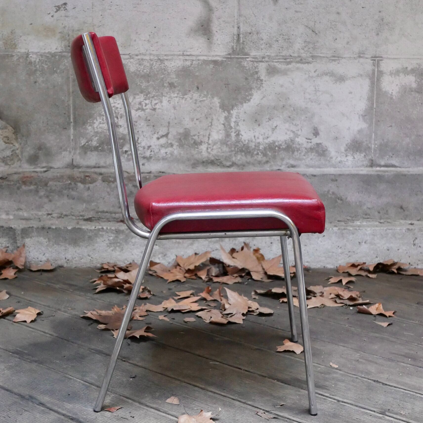 Pair of red leatherette chairs