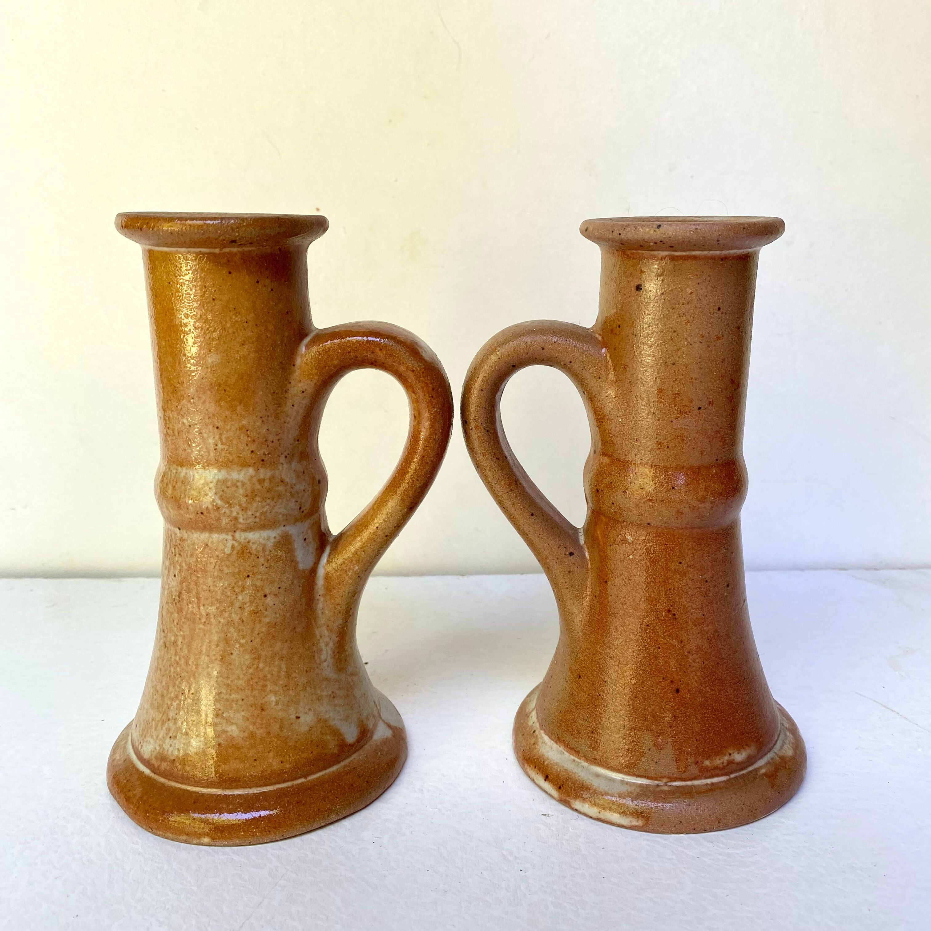 Pair of bohemian sandstone candle holders