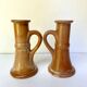 Pair of bohemian sandstone candle holders