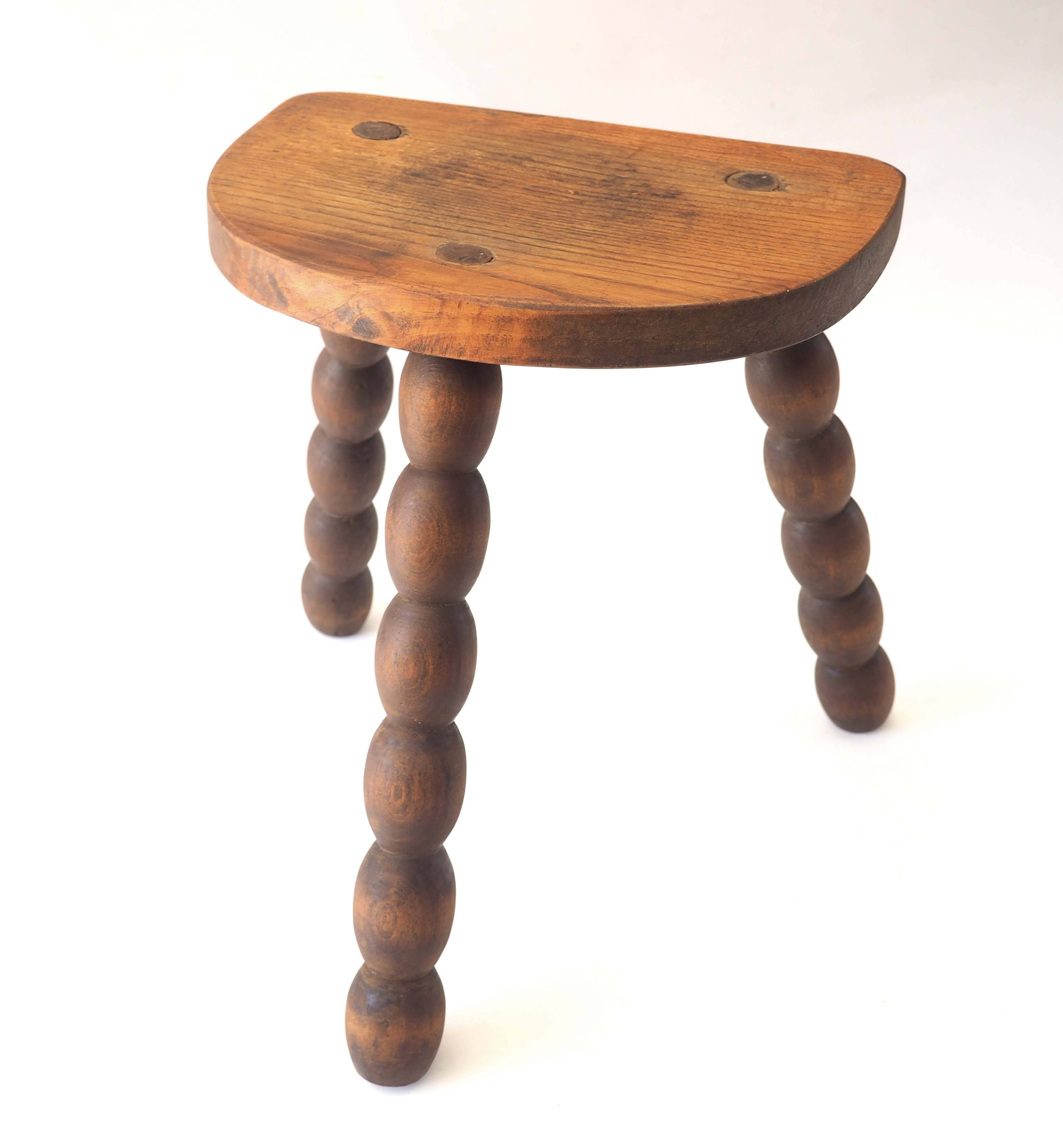 Beaded tripod stool