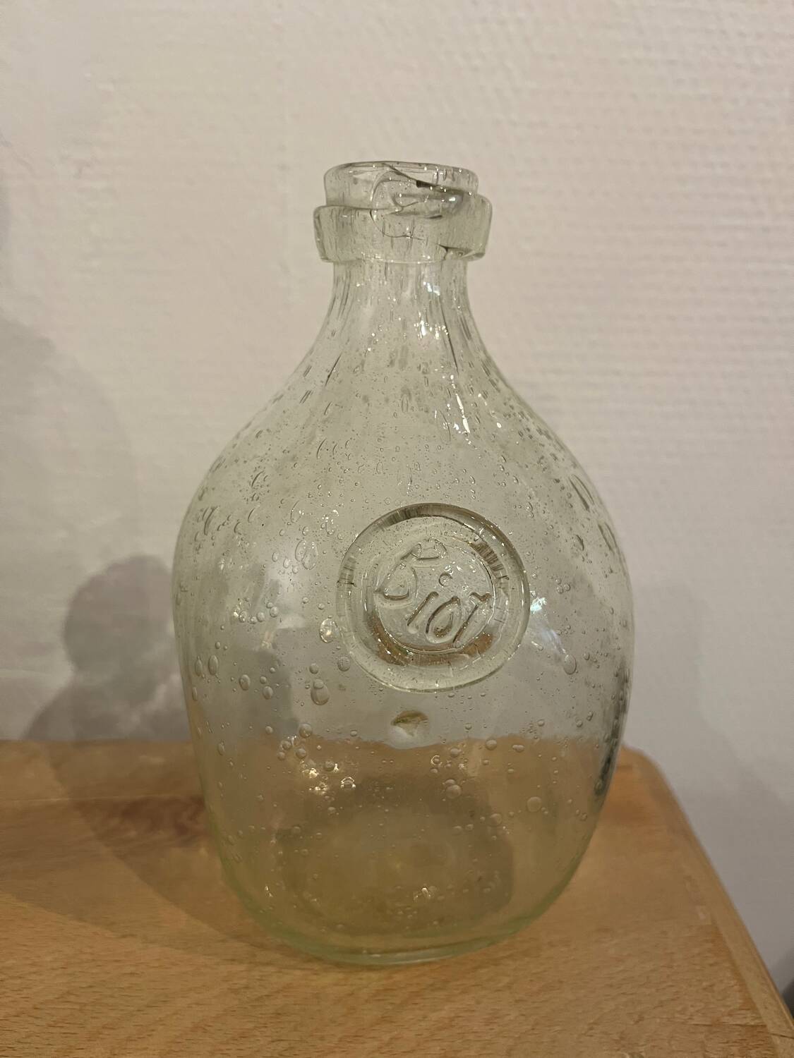Signed Biot bubble glass bottle