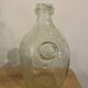 Signed Biot bubble glass bottle