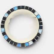 Round mosaic mirror in the style of Vallauris, France circa 1970.
