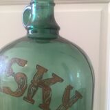 Green glass whiskey bottle
