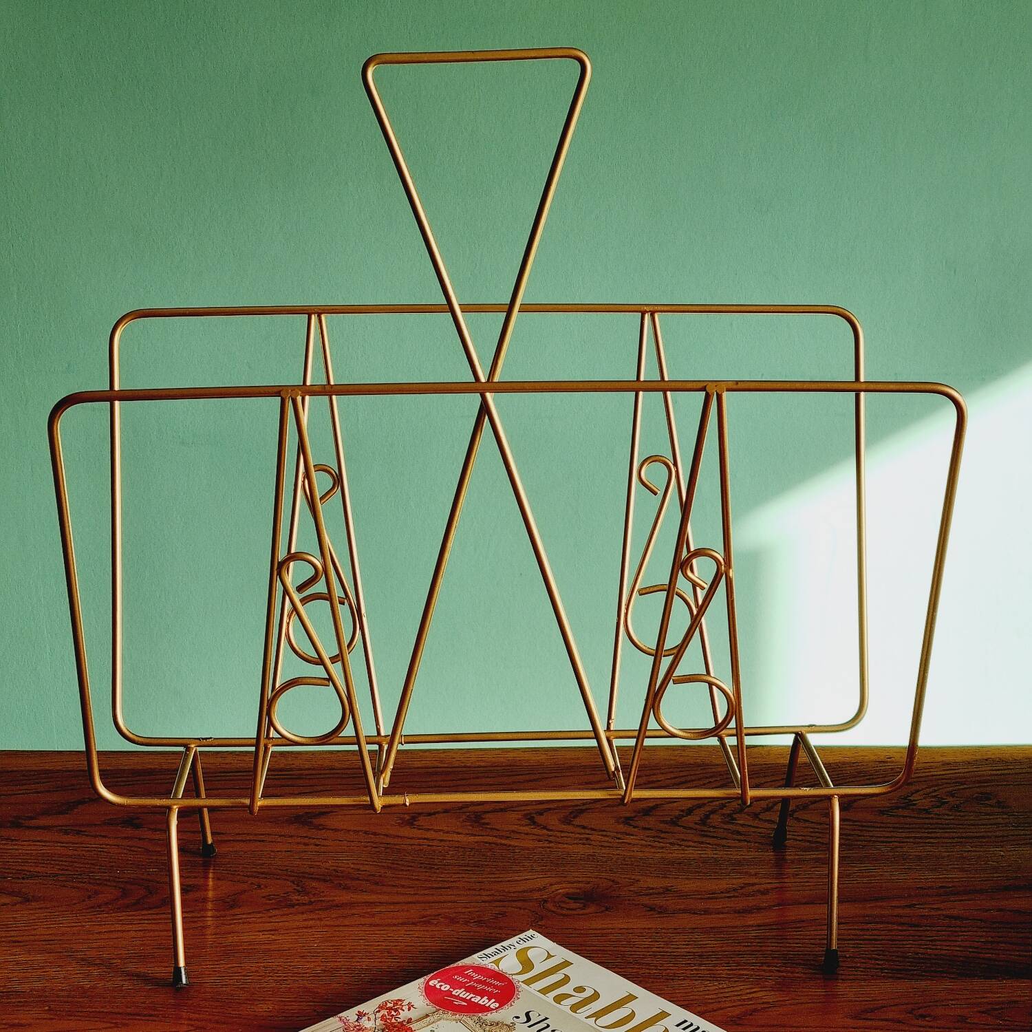 Golden metal magazine holder