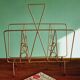 Golden metal magazine holder