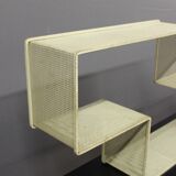 Dedal shelf by Mathieu Matégot in perforated iron