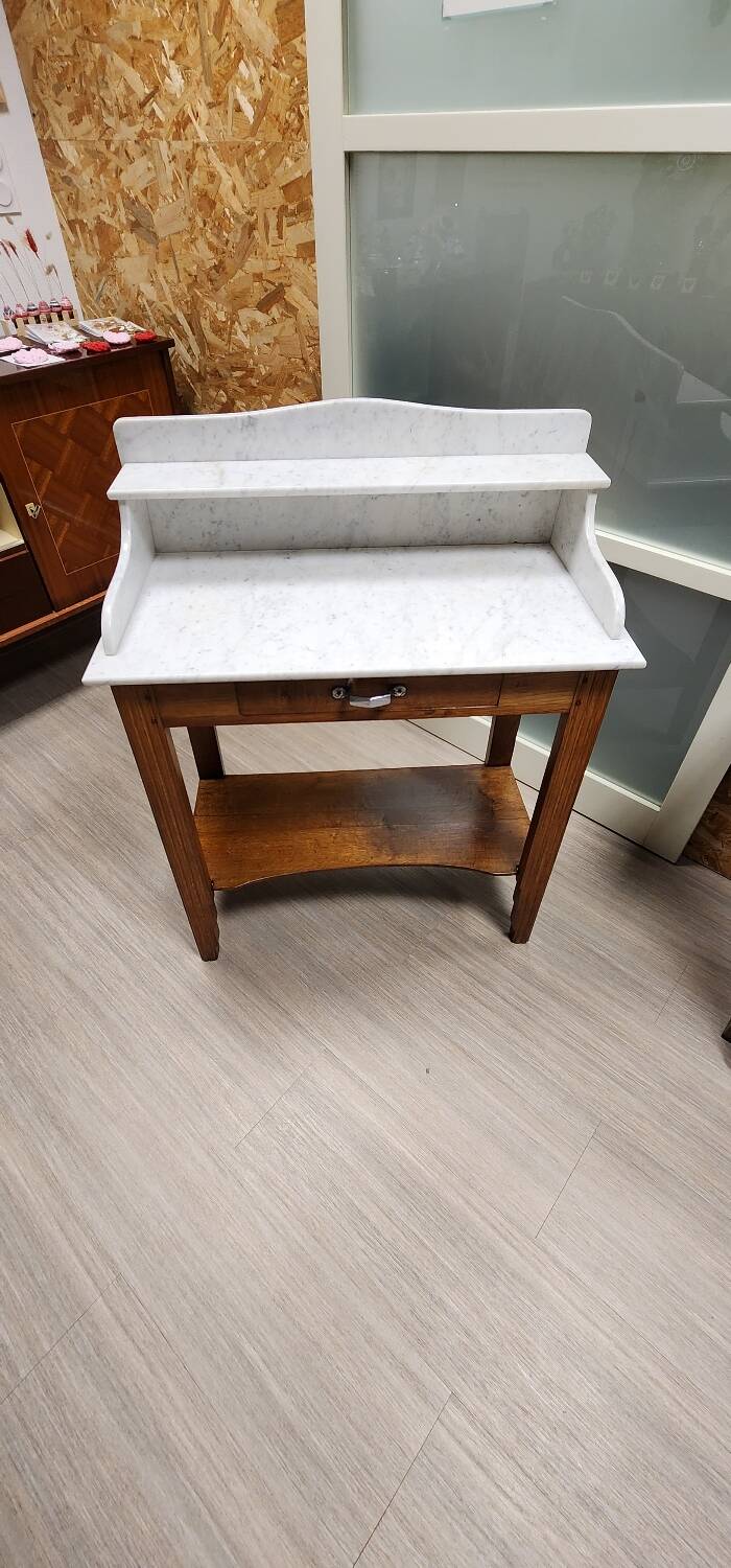 Old dressing table in wood and marble