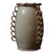 White glazed stoneware vase decorated with raised ribbons.