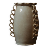 White glazed stoneware vase decorated with raised ribbons.