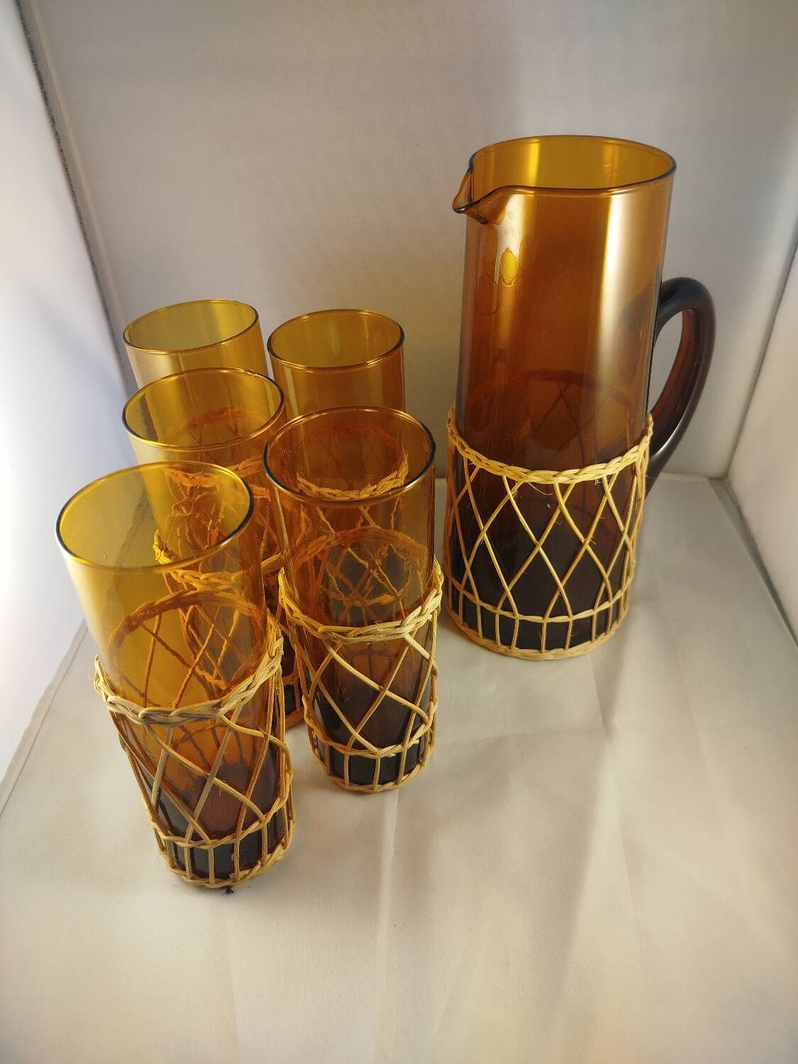 Carafe and 5 glasses set, amber glass and woven wicker, bohemian chic