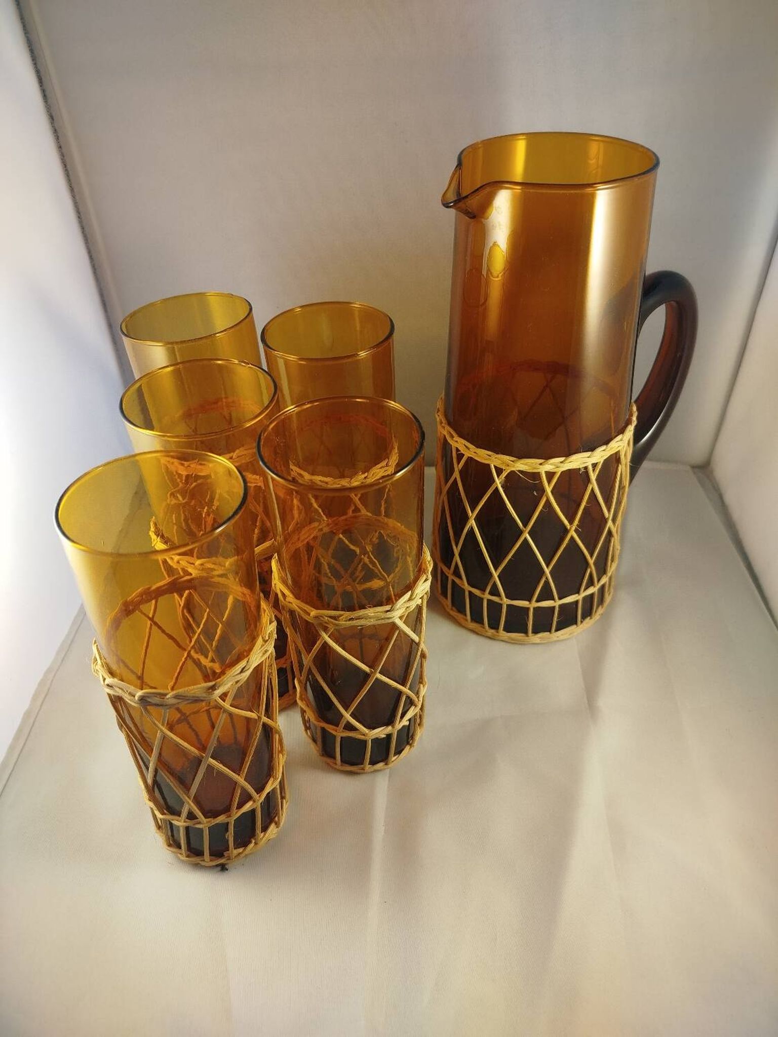 Carafe and 5 glasses set, amber glass and woven wicker, bohemian chic