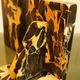 Pair of Portor marble bookends, black and golden yellow