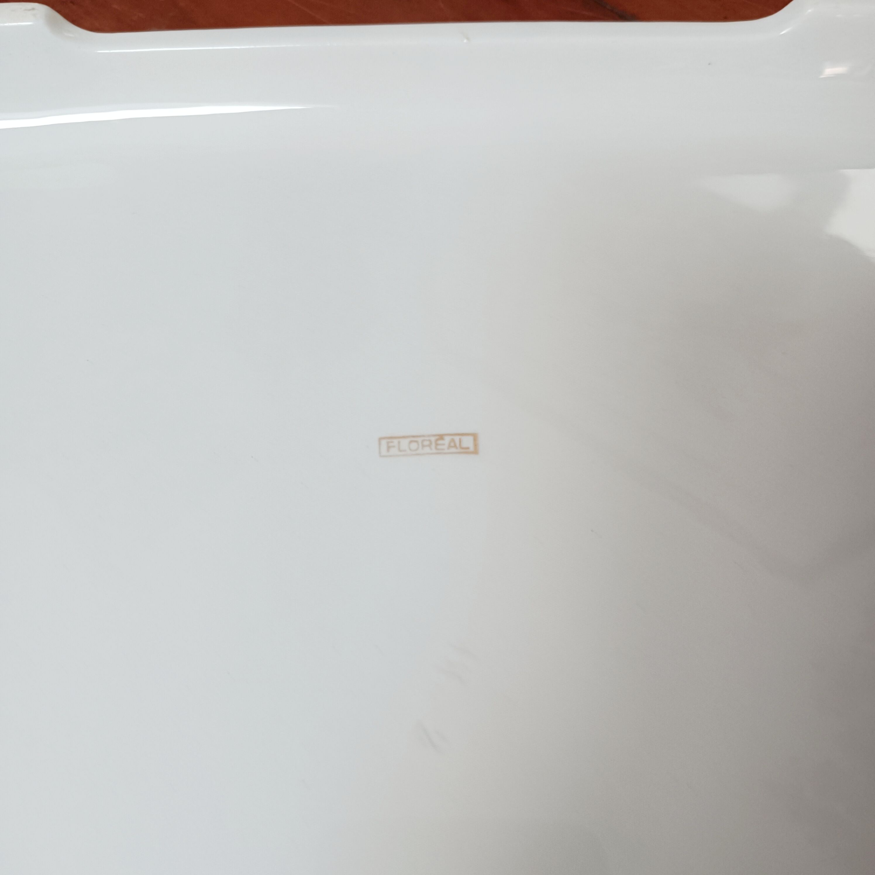 Flowery earthenware trivet