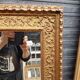 17th century Italian style gilded mirror in carved wood.