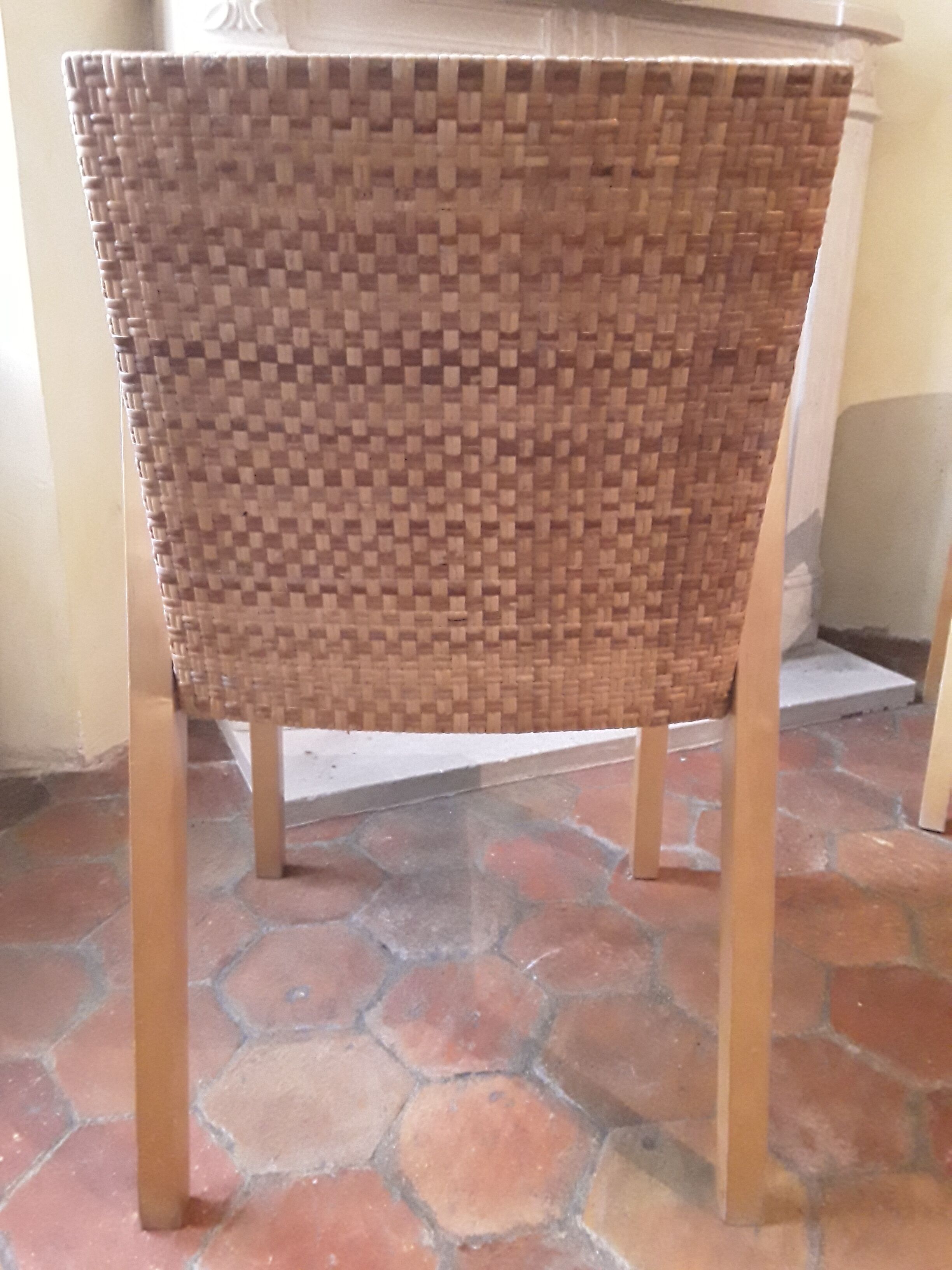 Two vintage braided straw armchairs