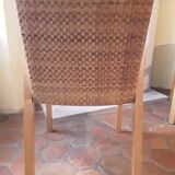 Two vintage braided straw armchairs