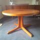 Round wooden table with 2 extensions, table with central star leg