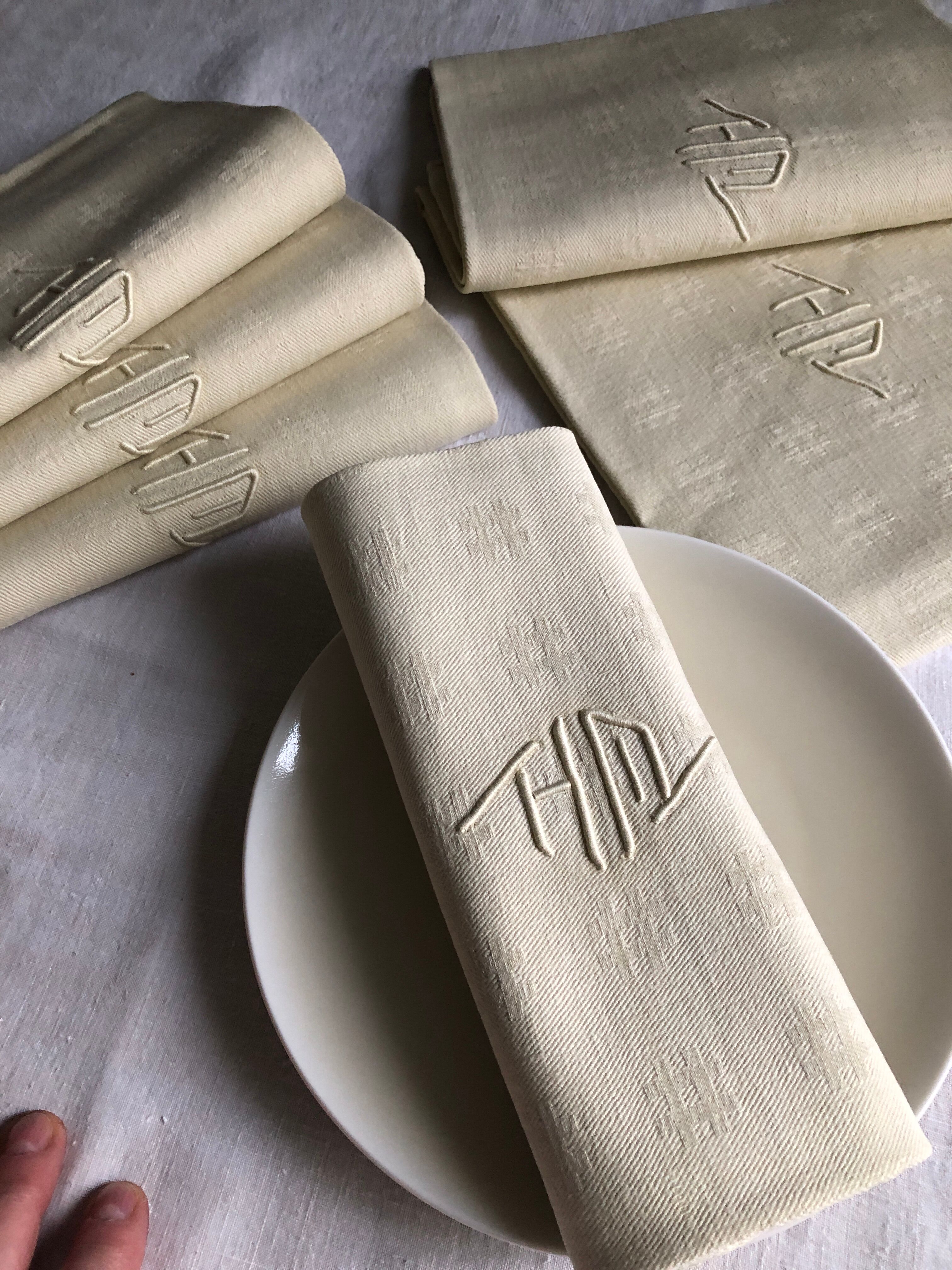 Antique napkins damascus and monogrammed tinted fresh butter