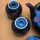 Head-to-head in ceramics - teapot and its 2 cups