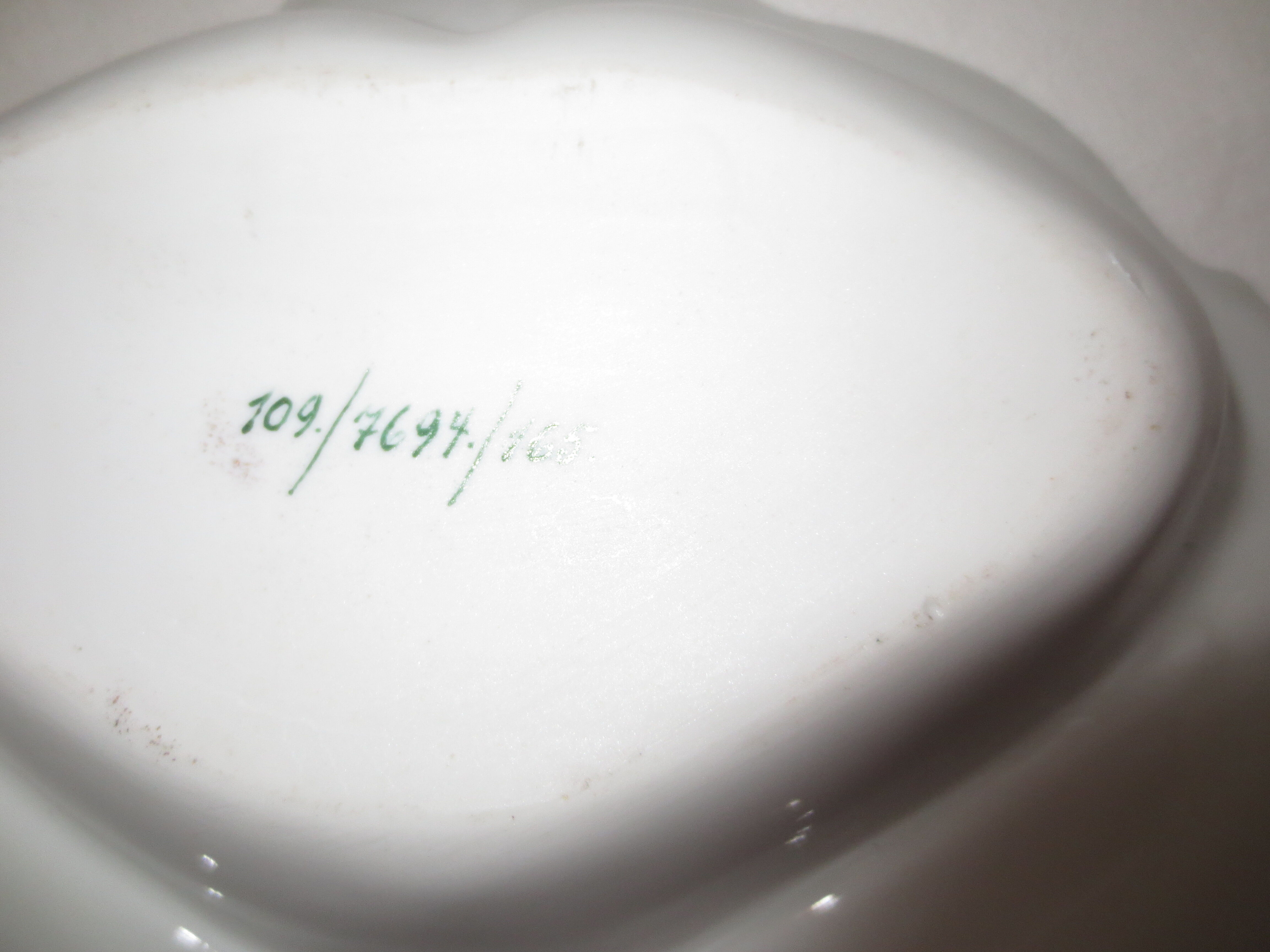 Numbered decorated porcelain quarter dish for hors d'oeuvre or other