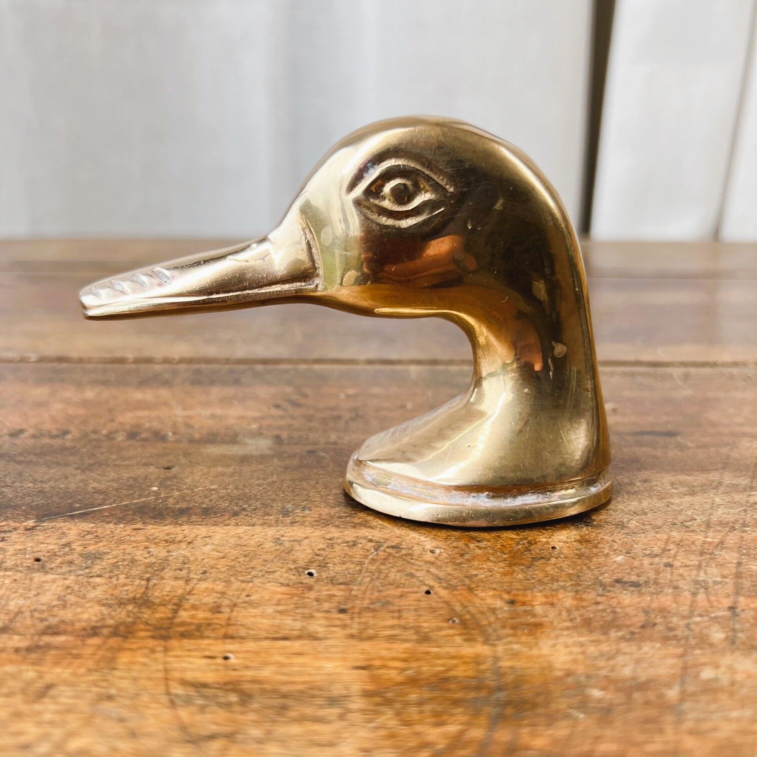 Brass bottle opener duck head
