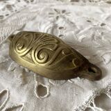 Old shell drawer handle in gilded brass