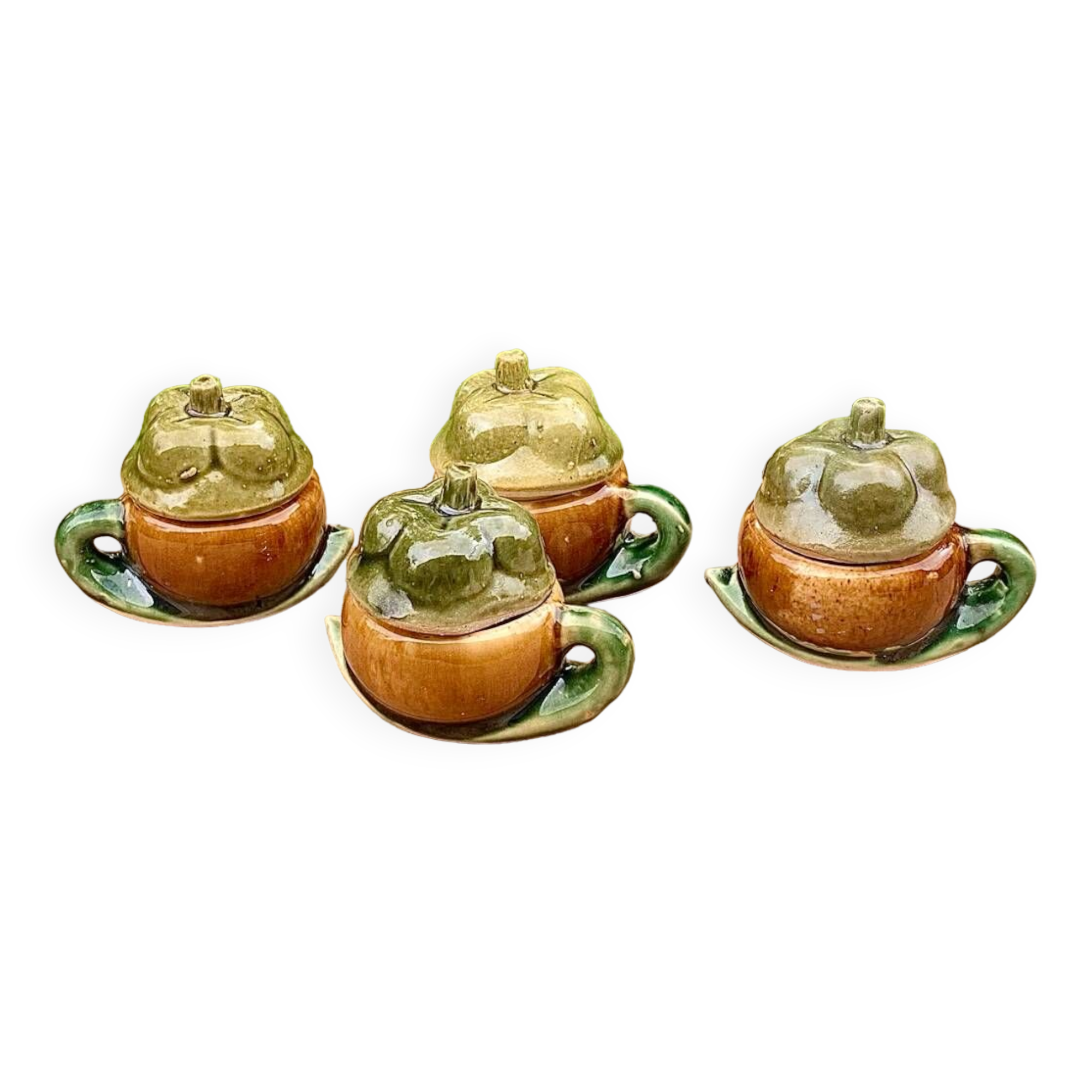 4 slip pots depicting a pepper, early 20th century