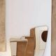 Contemporary rectangular mirror with rounded edges and embossed brass frame.