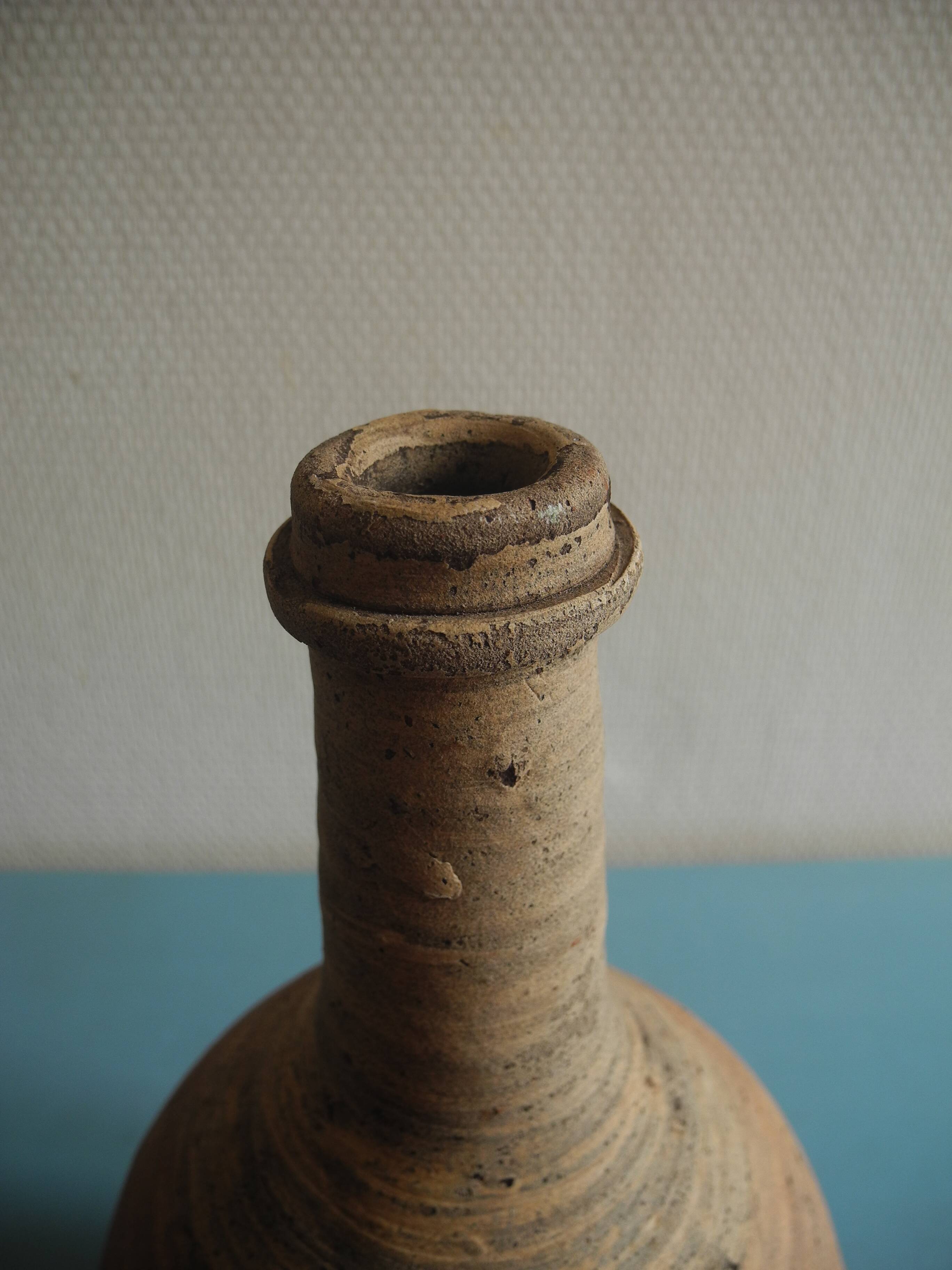 antique rustic decorative terracotta pottery bottle