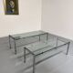 2 large nesting coffee tables in chrome and glass, 1970s design.