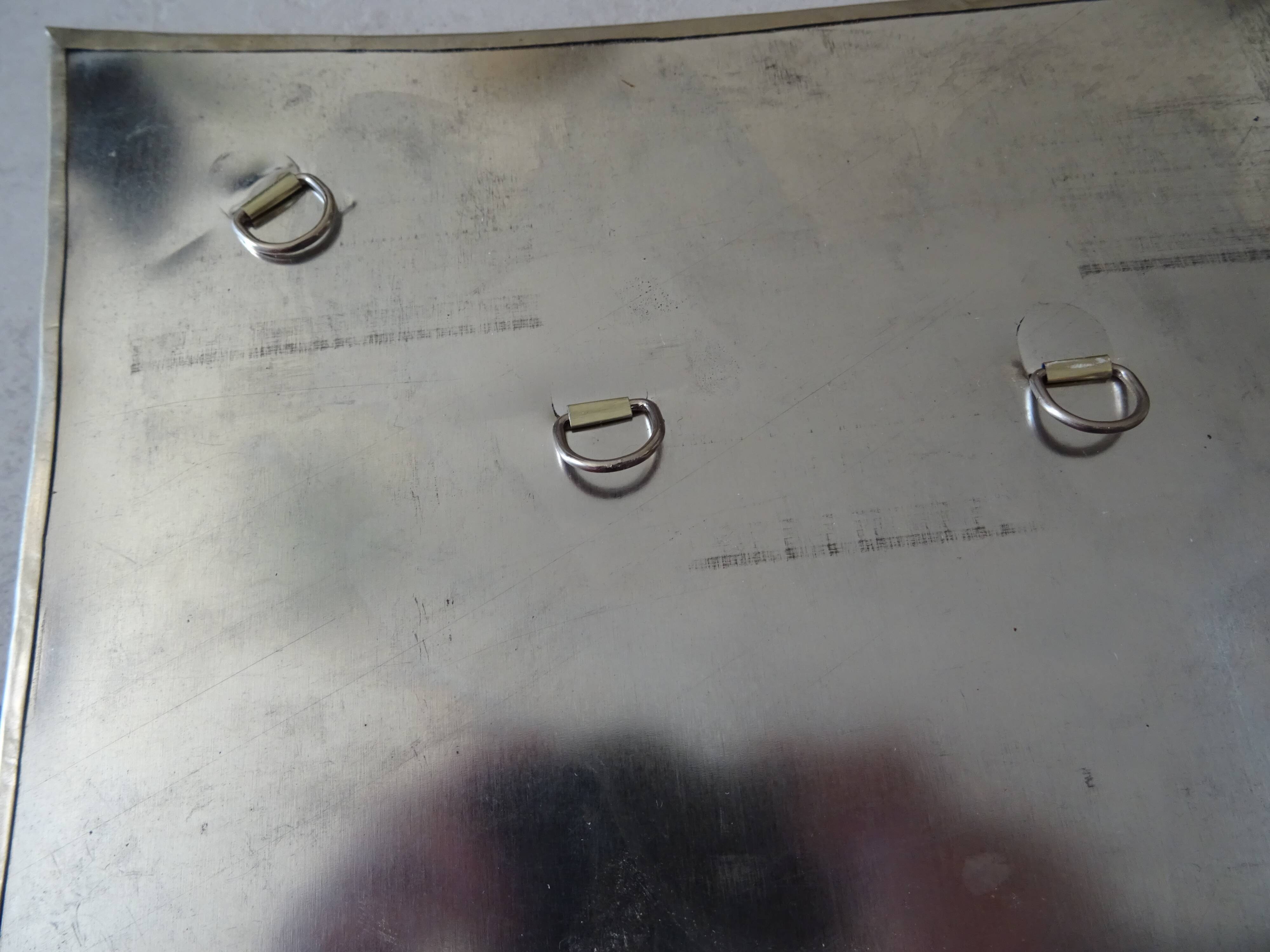 Hammered metal mirror design