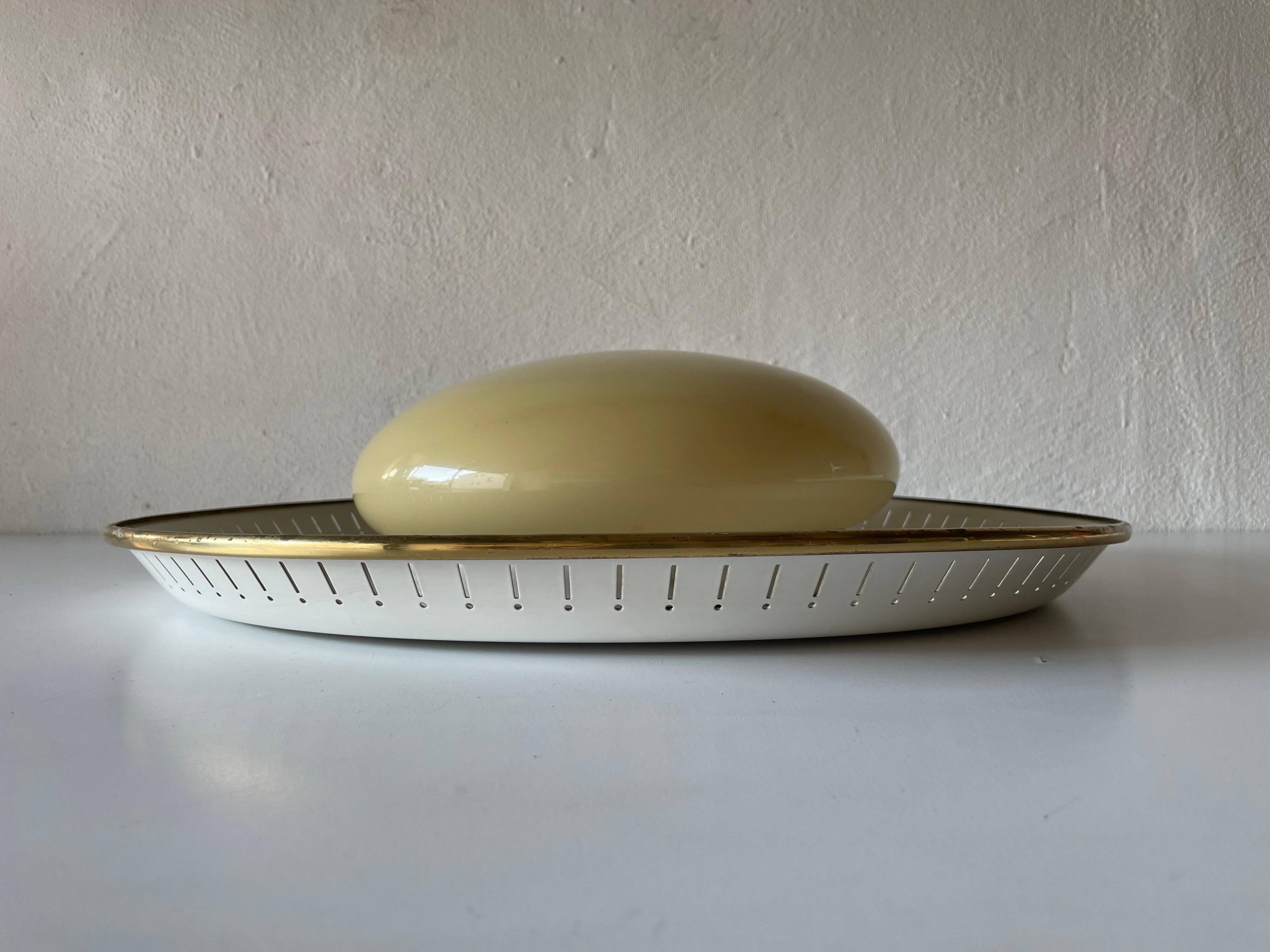 Brass disc and glass clip lamp from the mid-century by Hillebrand, 1950s, Germany.