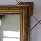 Mirror with gilded wood and stucco frame, early 20th century, 59x83cm