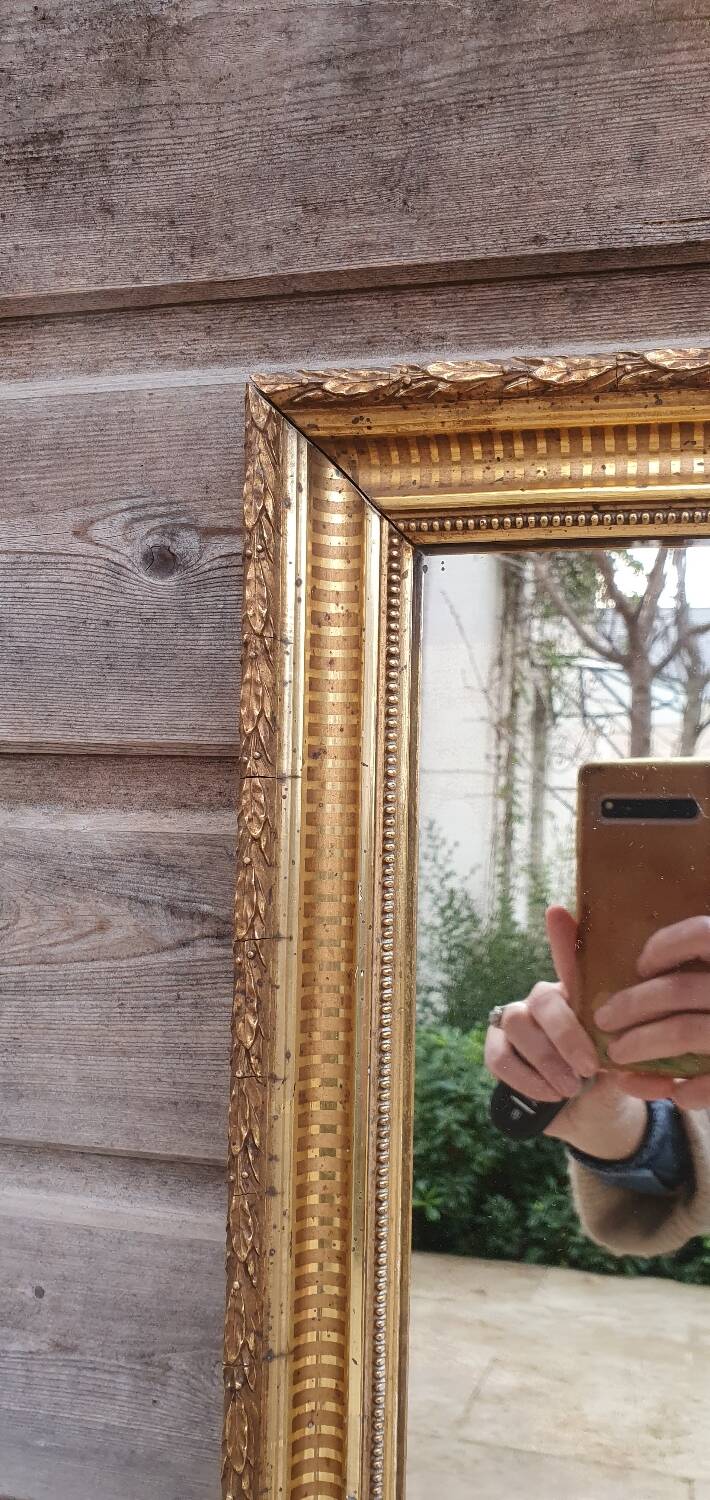 Miroir ancien doré à la feuille