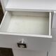 White bathroom storage cabinet from the 80s