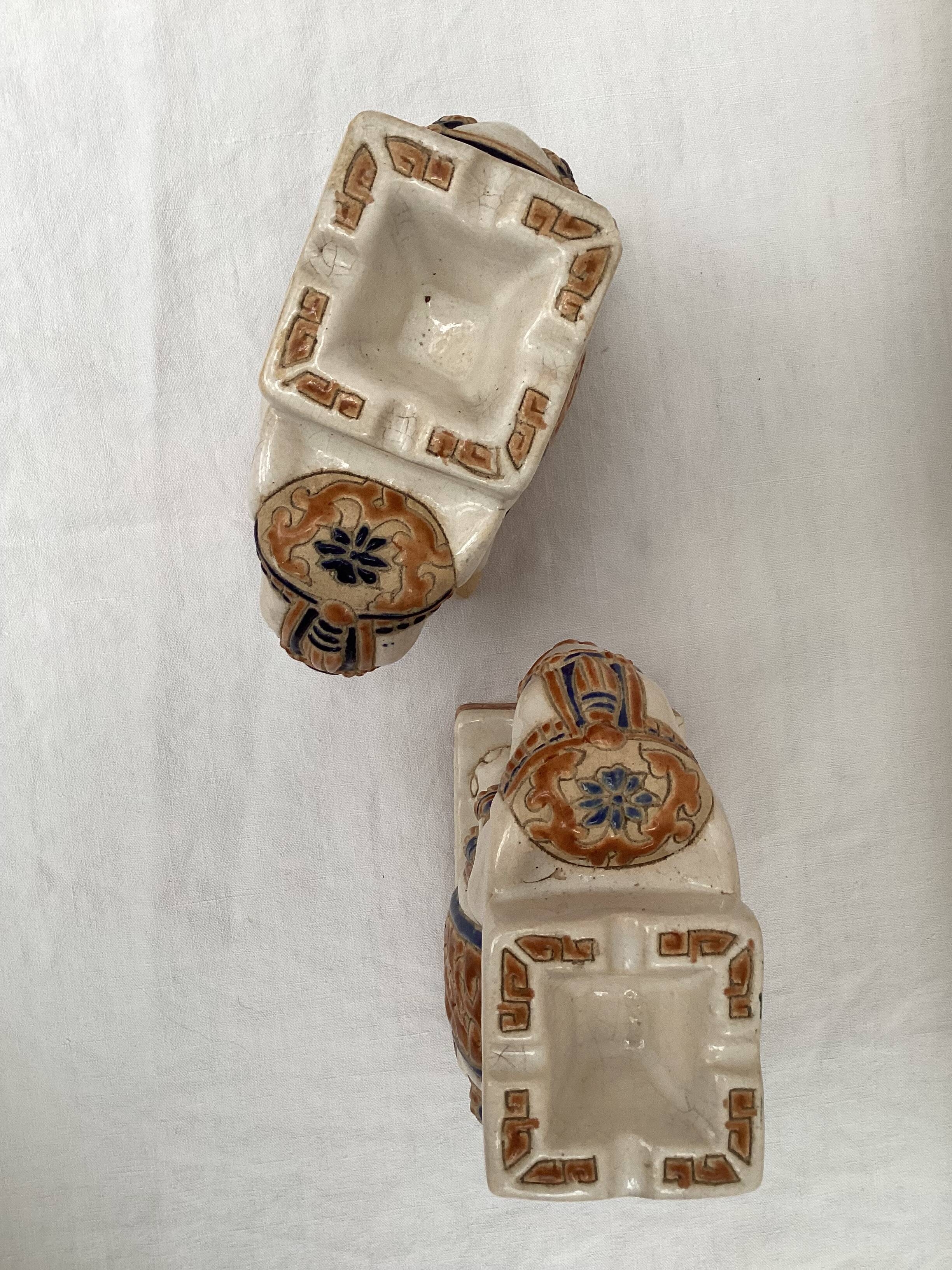Pair of ceramic elephant ashtrays dimensions: height -14cm- width -13.5cm-