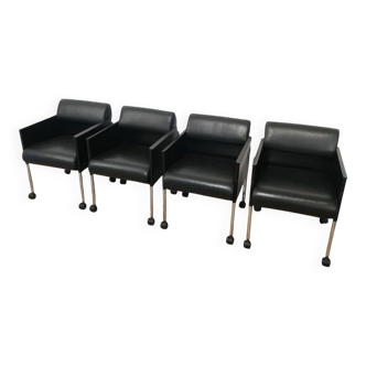 Set of 4 armchairs in leather and black lacquered metal. Rosenthal