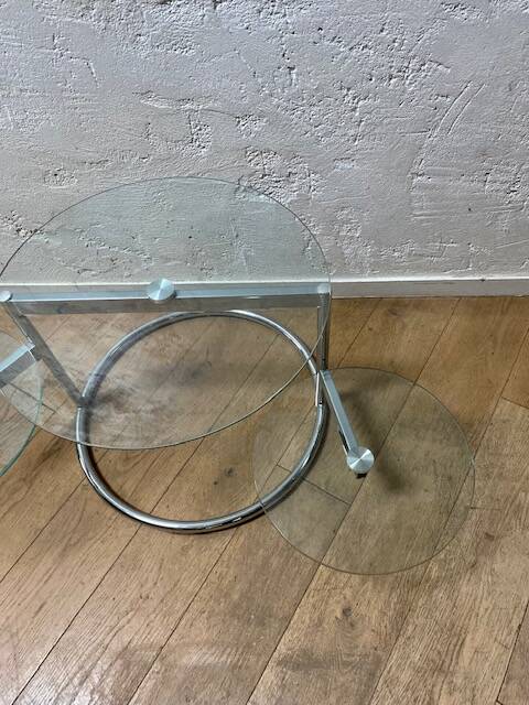 Glass coffee table with 2 swivel tops