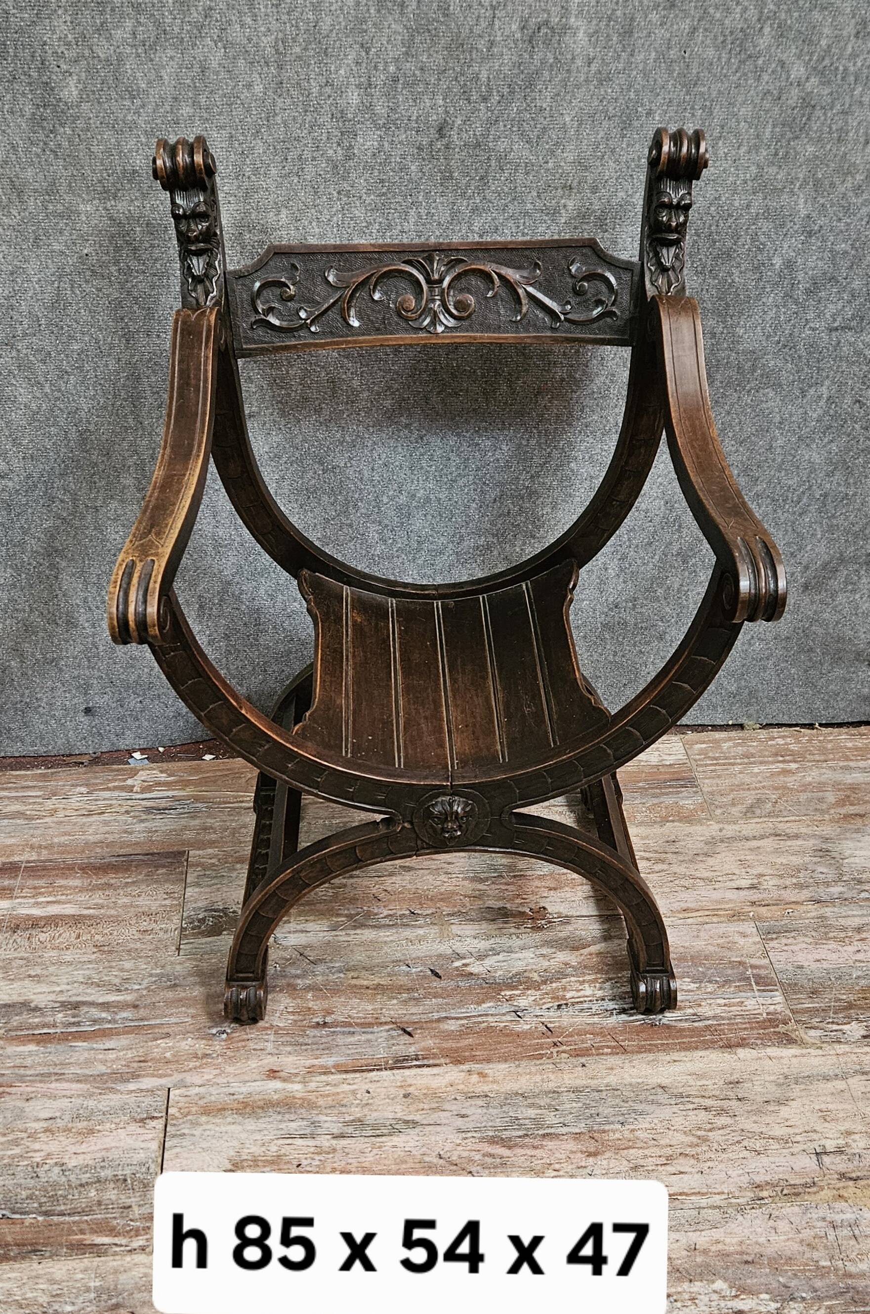 Antique curule chair in carved wood – Renaissance / Savonarole style